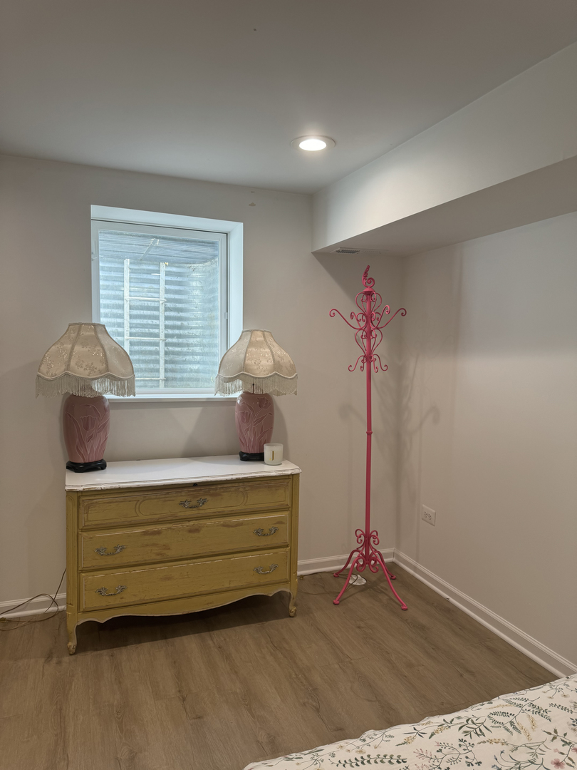 644 West Hinsdale Avenue Hinsdale, IL 60521 - Photo 7 of 17 a view of room with wooden floor and windows