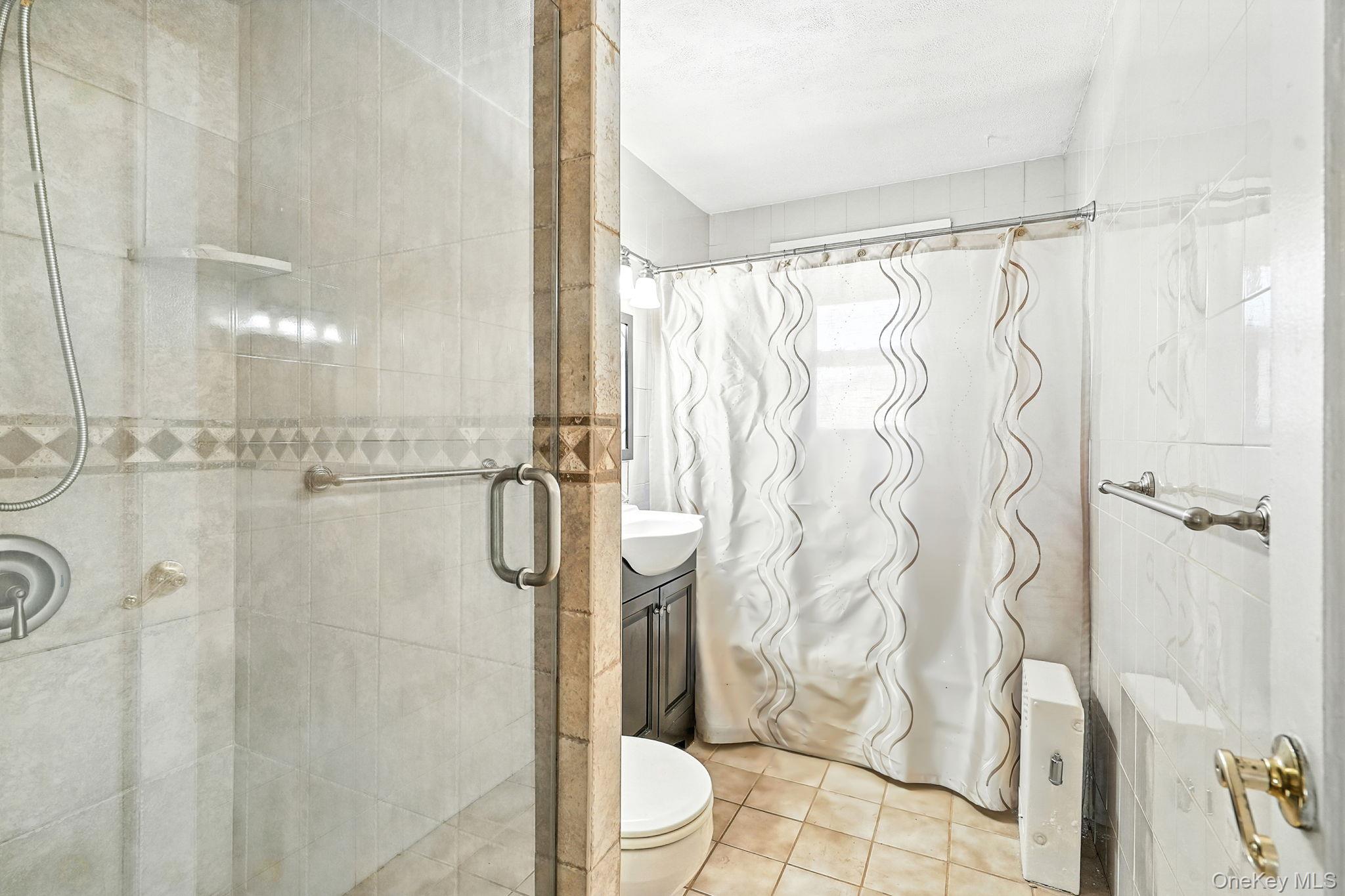 1245 Rhinelander Avenue Bronx, NY 10461 - Photo 22 of 34 Upstairs Hall Bathroom