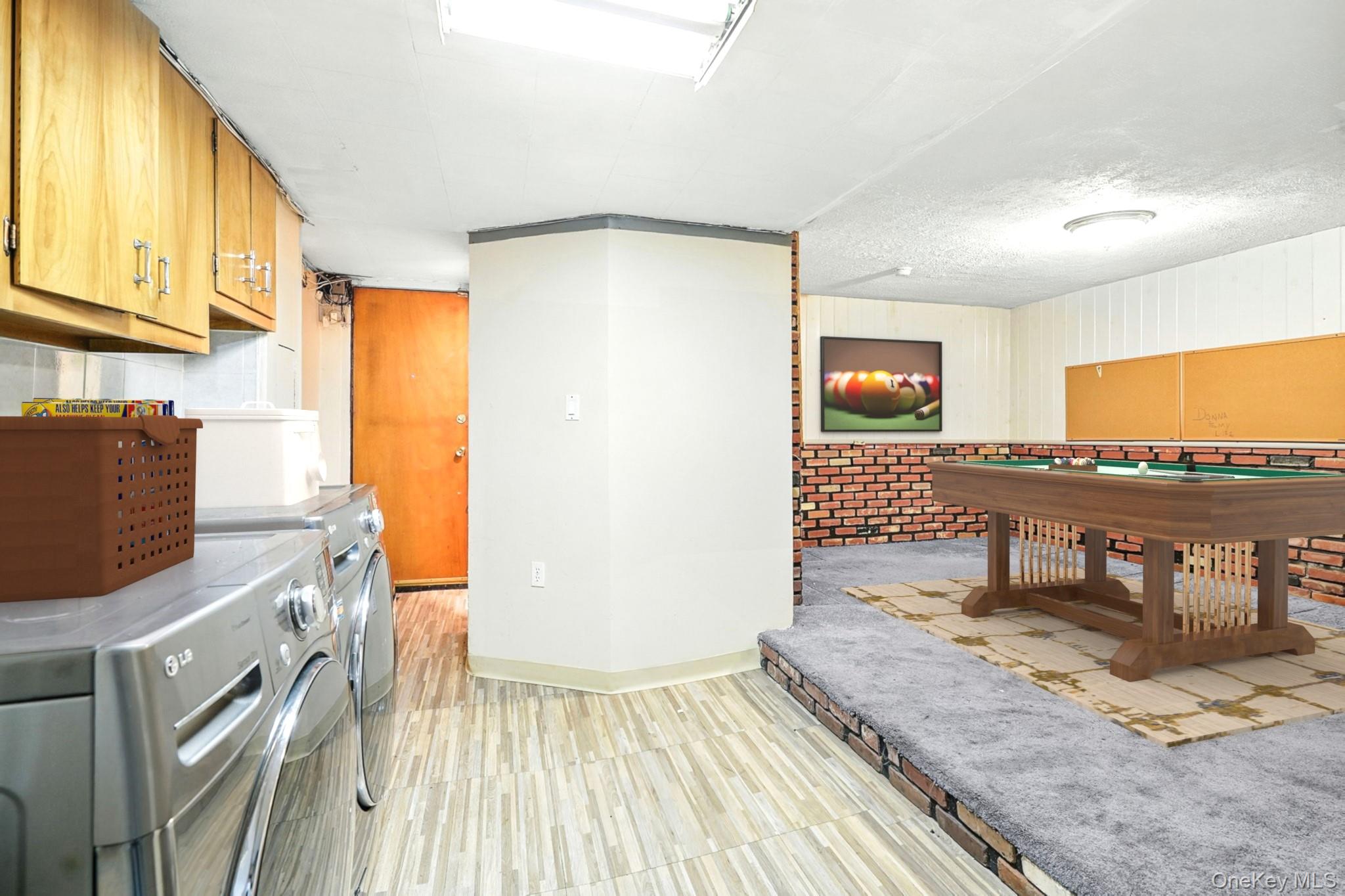 1245 Rhinelander Avenue Bronx, NY 10461 - Photo 24 of 34 Lower Level Laundry Area and Recreation Area - Virtually Staged