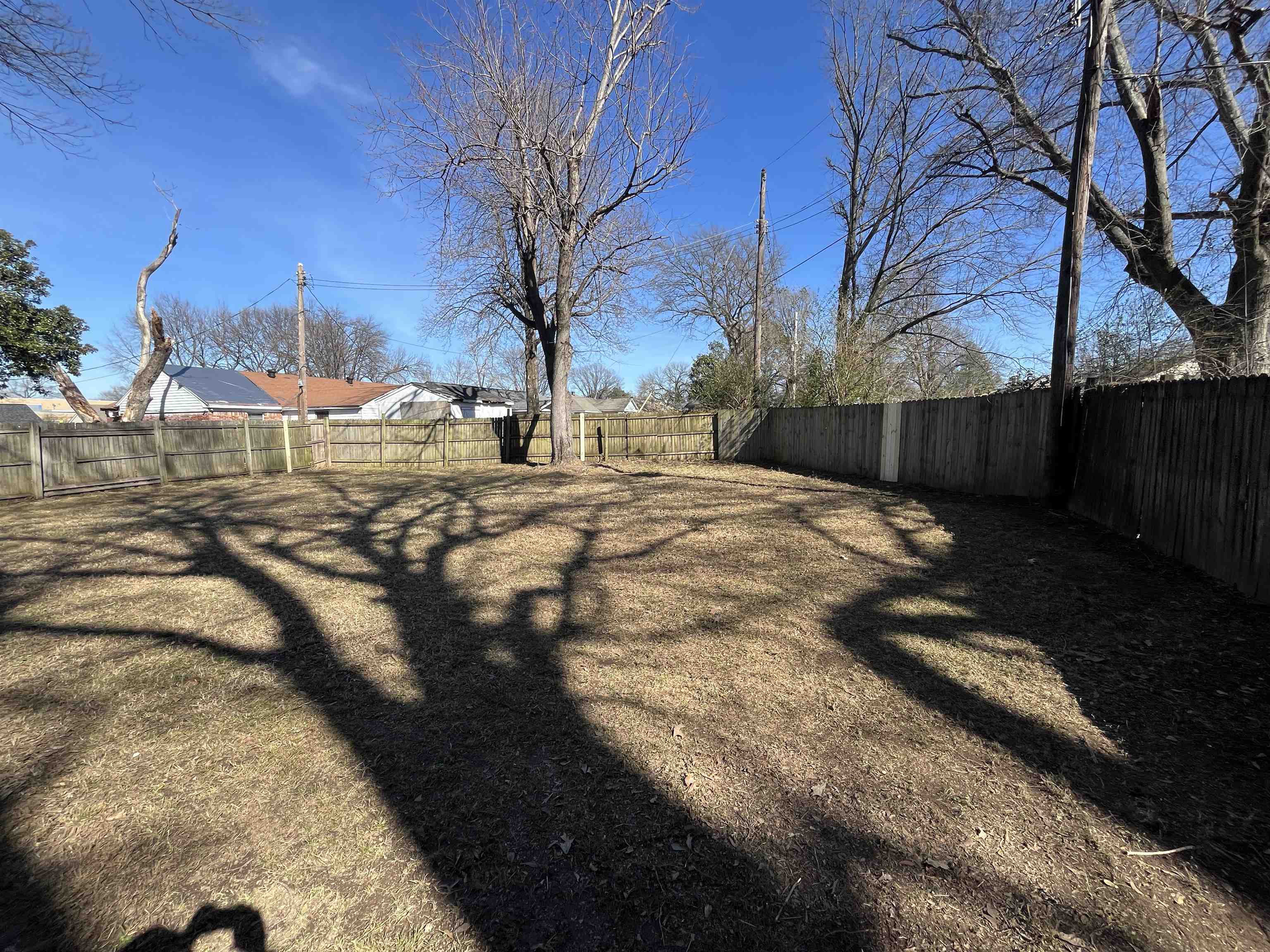 3062 Claudette Road Memphis, TN 38118 - Photo 12 of 13 View of yard featuring a fenced backyard