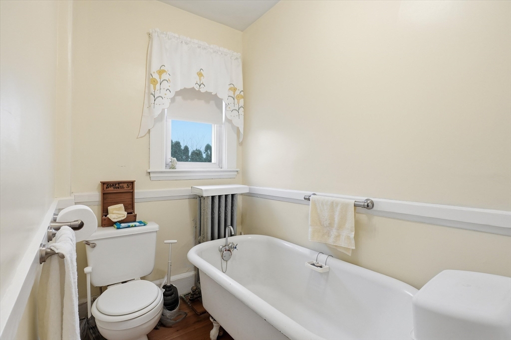 24 Fairview Avenue Swampscott, MA 01907 - Photo 20 of 39 a white toilet sitting next to a bathroom sink