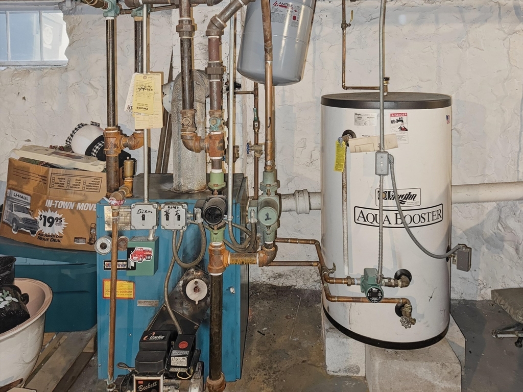 24 Fairview Avenue Swampscott, MA 01907 - Photo 24 of 39 a bathroom with a sink and mirror