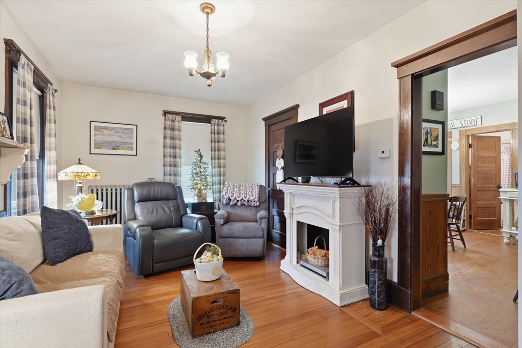 24 Fairview Avenue Swampscott, MA 01907 - Photo 4 of 39 a living room with furniture and a flat screen tv