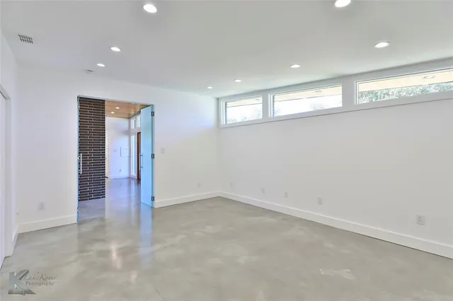 a bedroom with a bed and a walk in closet