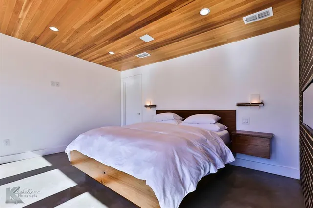 a bathroom with a double vanity sink mirror and double