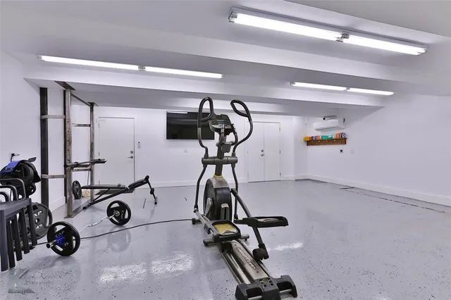 a kitchen with a sink cabinets and window
