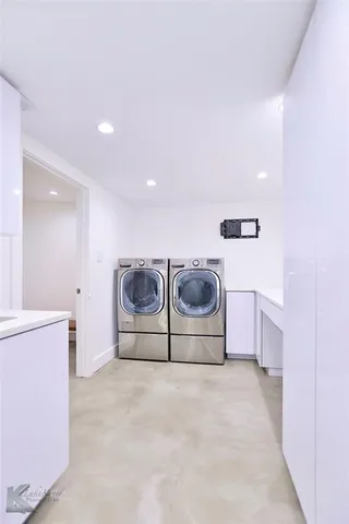 a swimming pool with outdoor seating and yard