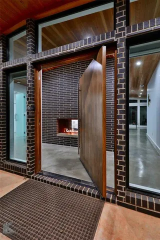 a view of a living room with entryway