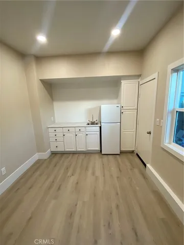 a view of swimming pool with seating area