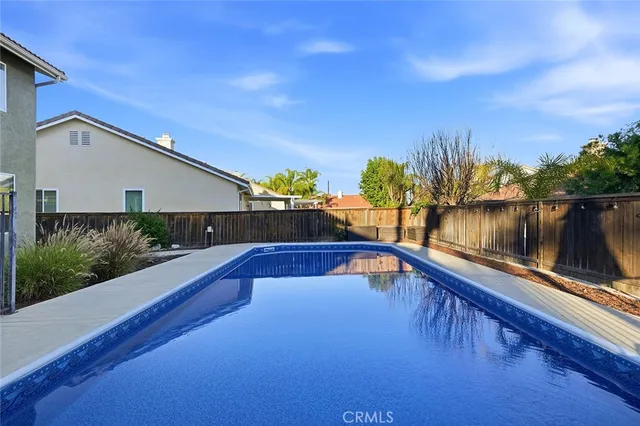 an aerial view of residential building and ocean