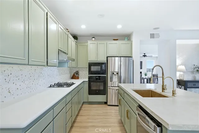 a living room with furniture fireplace and flat screen tv