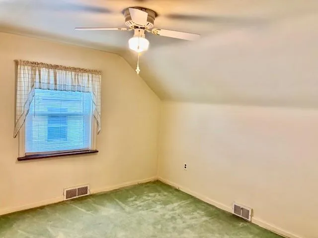 a view of a room with a workspace