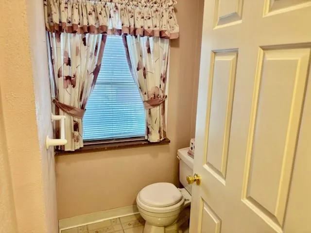 a view of porch with a yard