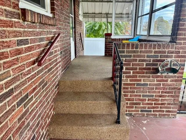 a view of backyard with a garden and plants