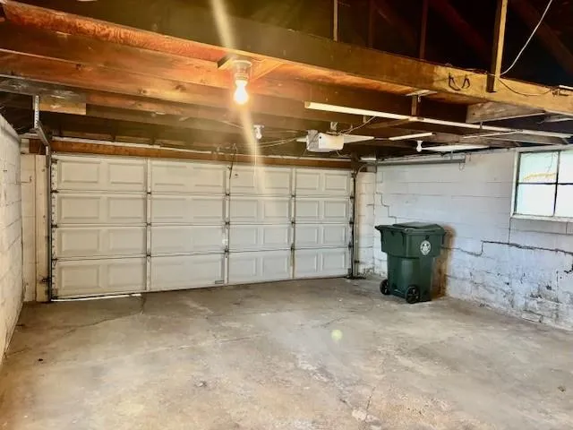 a view of a door and a window