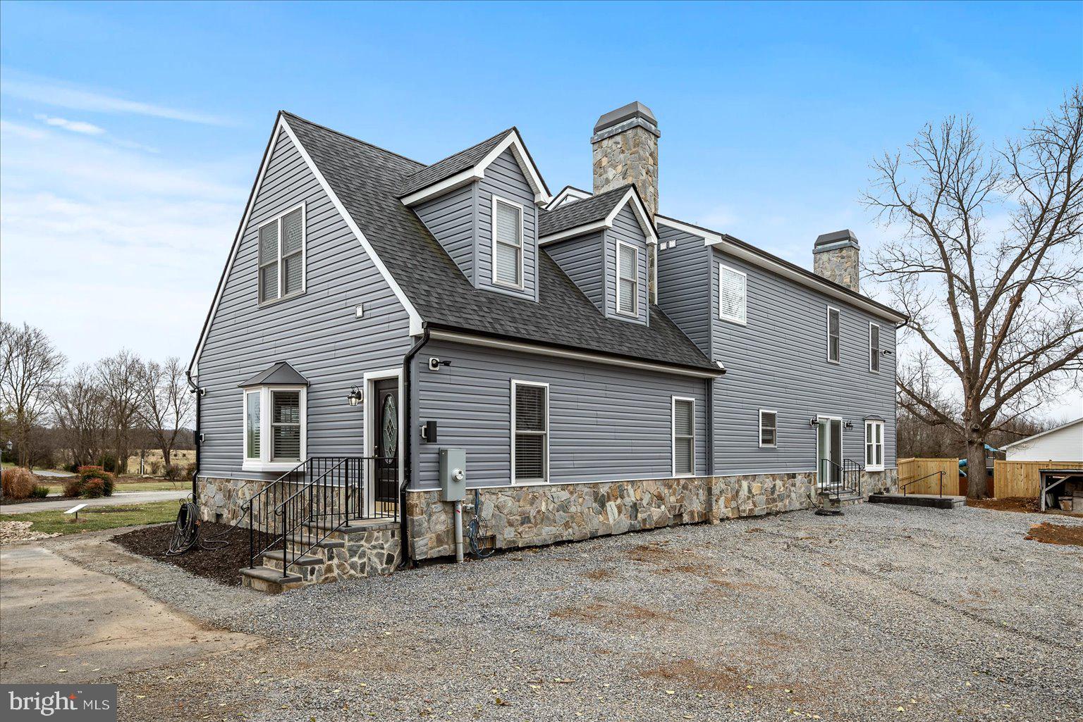 978 Old Charles Town Road Berryville, VA 22611 - Photo 21 of 31 a front view of a house with a yard