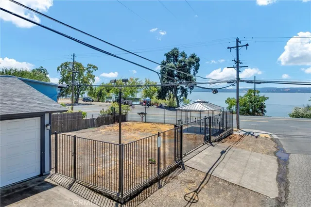 a building outdoor space with patio furniture and potted plants