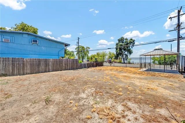 a view of a backyard of a house