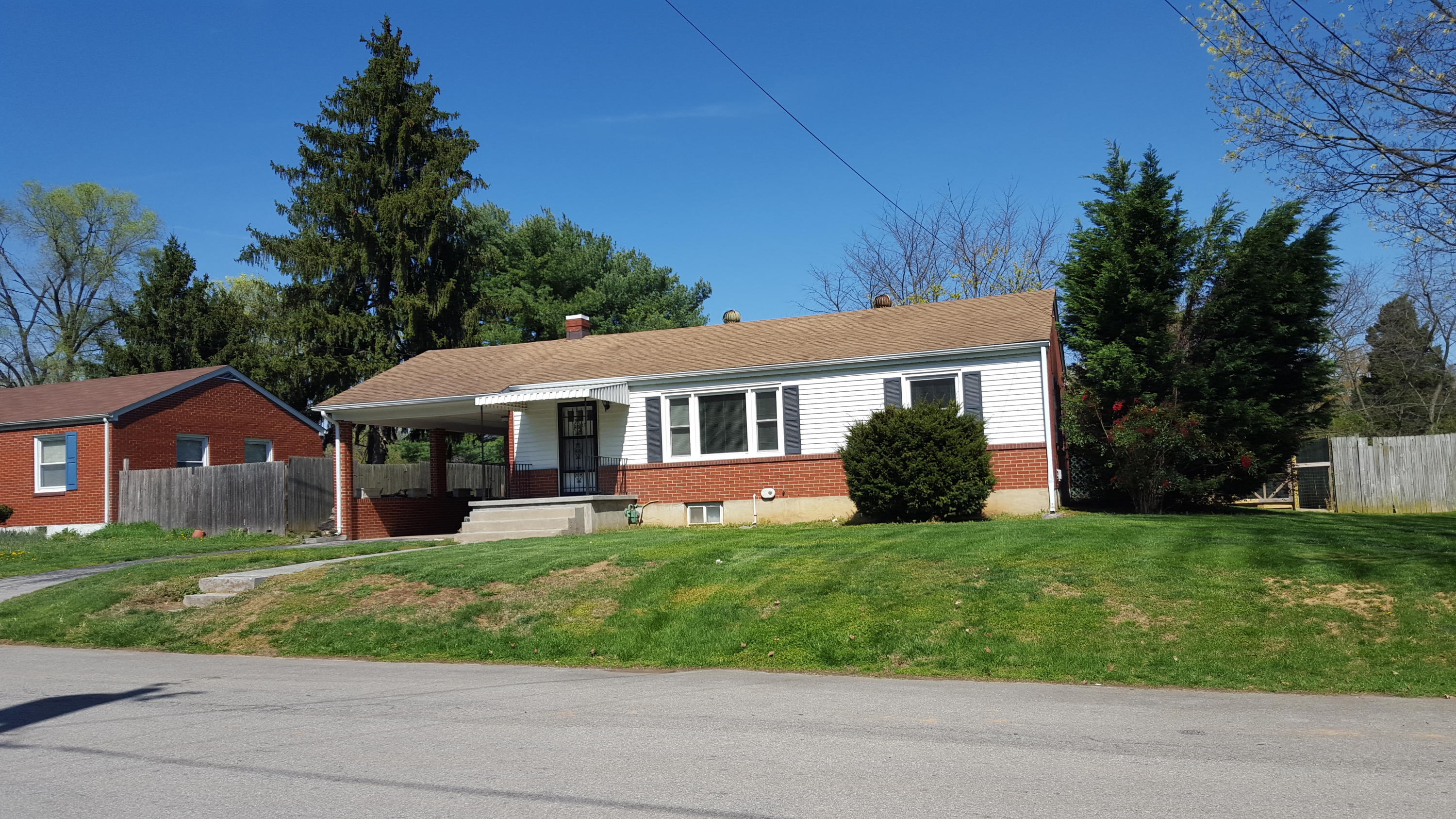 1927 Laura Road Northwest Roanoke, VA 24017 - Photo 1 of 19 a view of a house with a yard