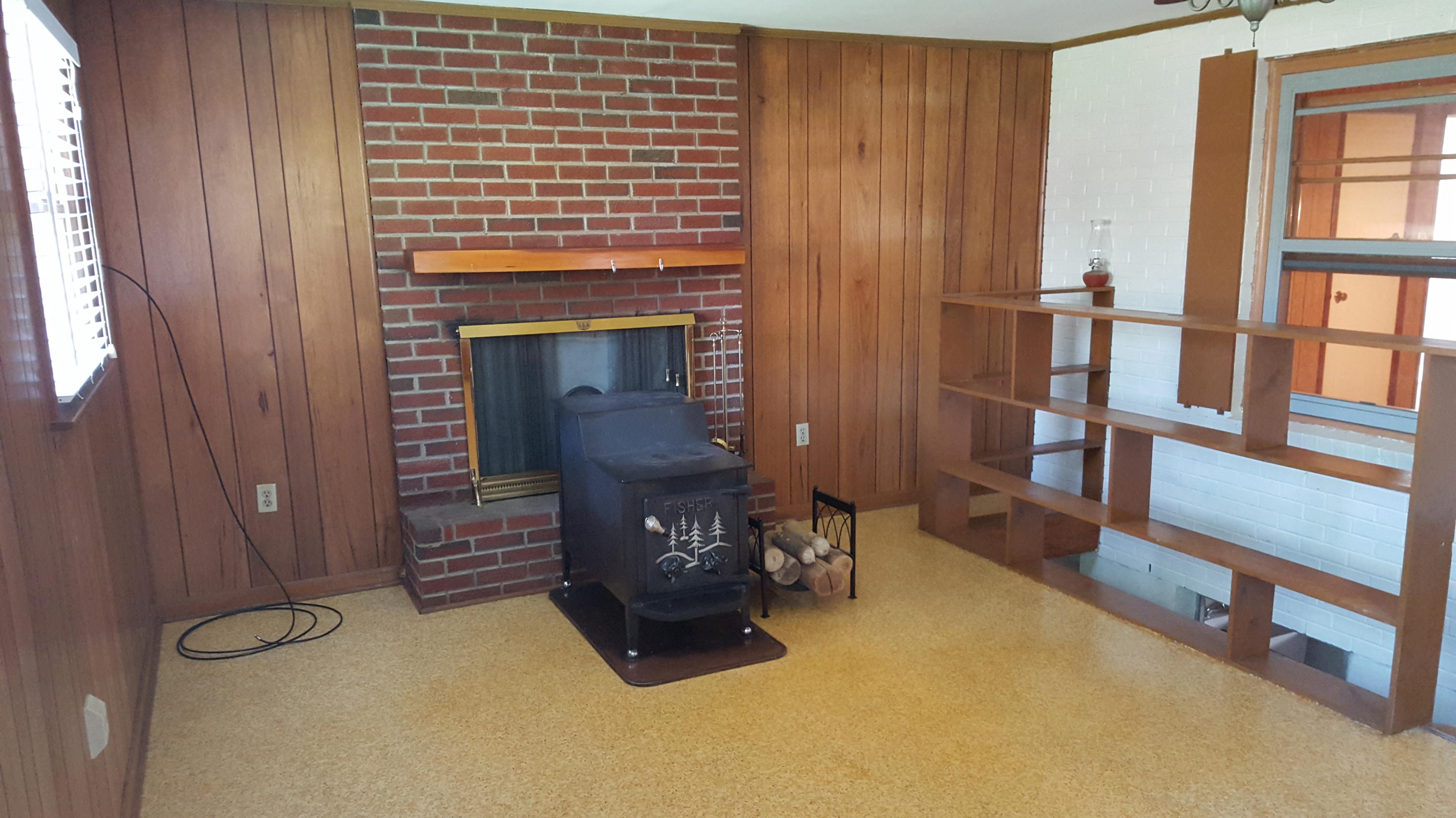 1927 Laura Road Northwest Roanoke, VA 24017 - Photo 11 of 19 a room with furniture and a fireplace