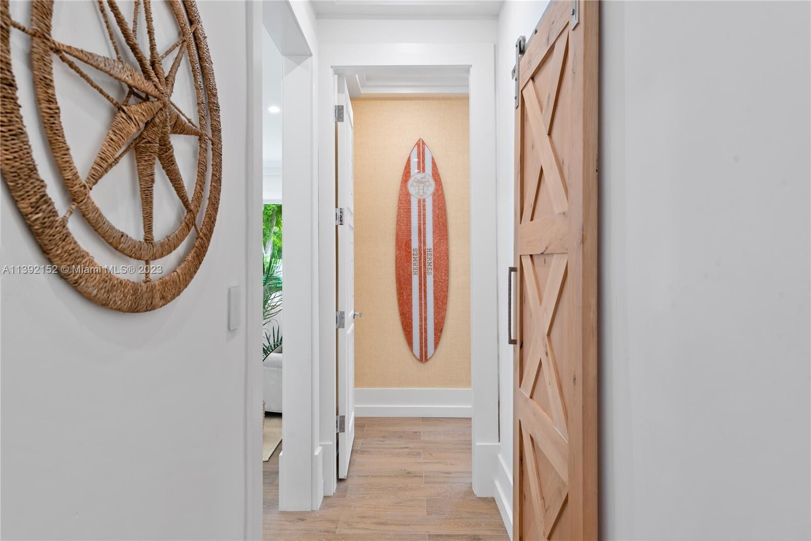 2575 Pine Tree Drive Miami Beach, FL 33140 - Photo 19 of 37 a view of a storage & utility room