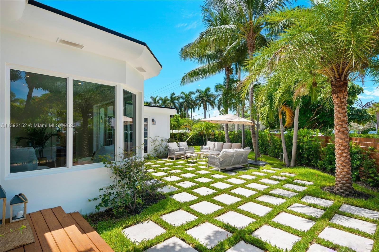2575 Pine Tree Drive Miami Beach, FL 33140 - Photo 34 of 37 a view of outdoor space yard and patio