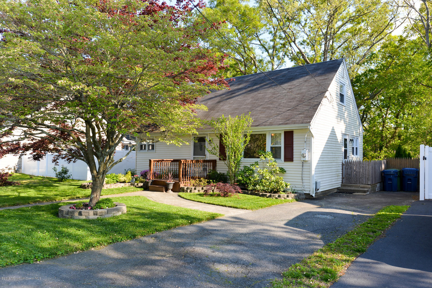 512 Lakewood Road Neptune Township, NJ 07753 - Photo 2 of 28 a view of a house with yard and tree s