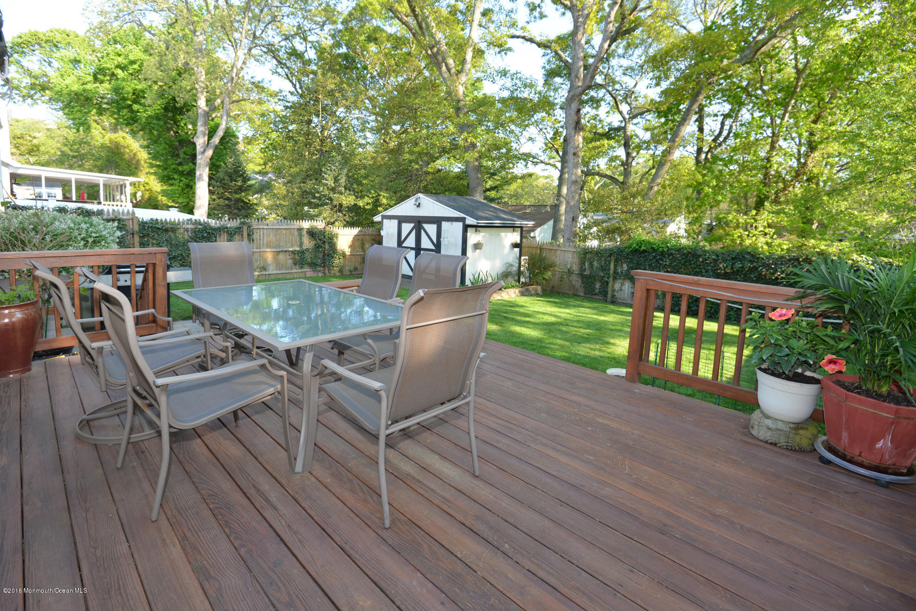 512 Lakewood Road Neptune Township, NJ 07753 - Photo 22 of 28 a view of a patio with a table and chairs