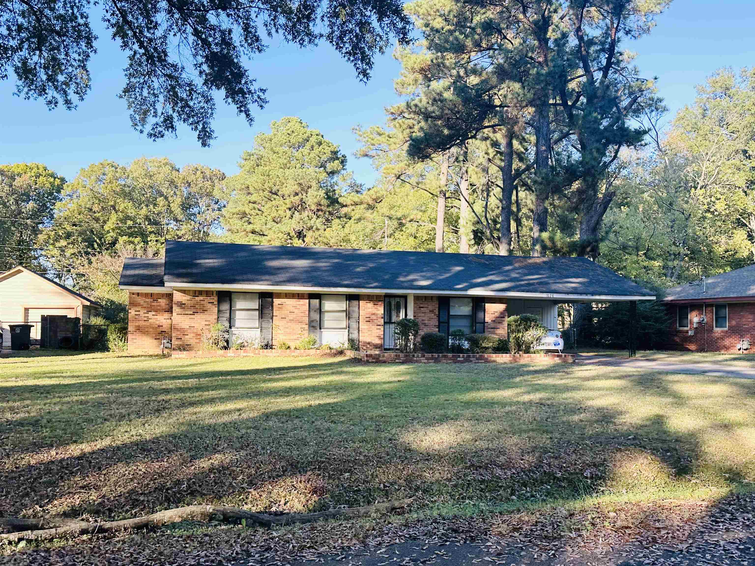 1628 Puryear Road Memphis, TN 38116 - Photo 1 of 1 a view of a house with a big yard