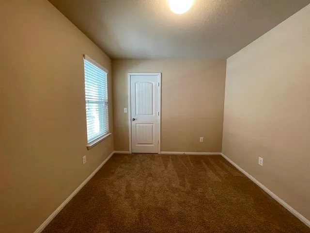 a bathroom with a sink toilet a mirror and shower