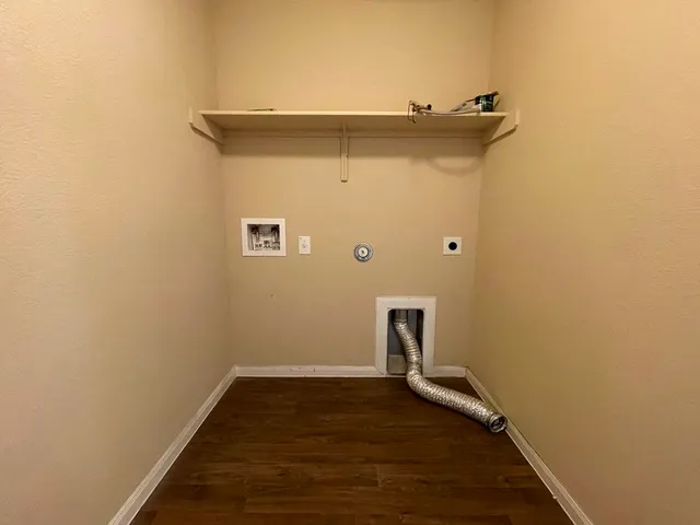 a patio with table and chairs