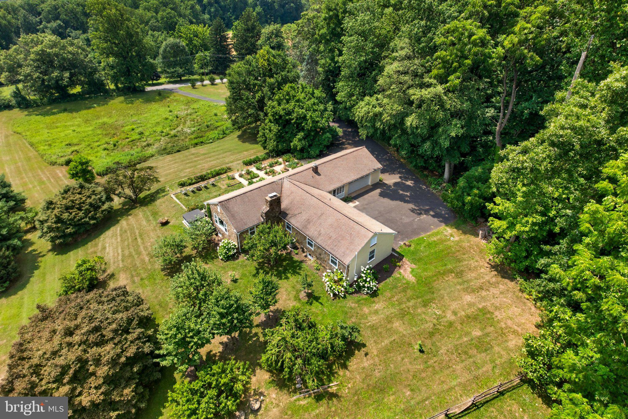 1015 Chester Springs Road Phoenixville, PA 19460 - Photo 65 of 68 Serene retreat amidst lush greenery.