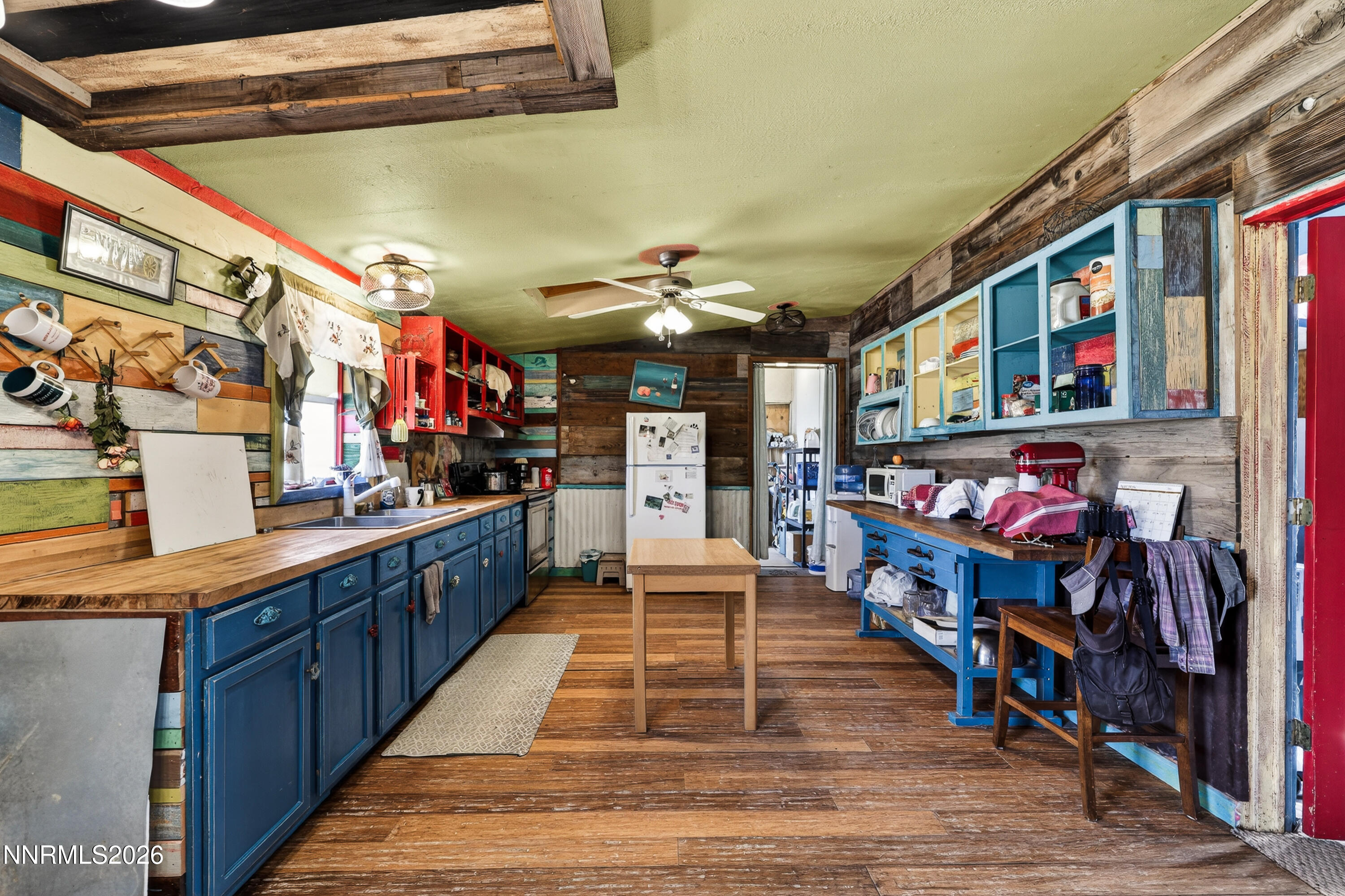 6877 Victor Drive Fallon, NV 89406 - Photo 11 of 50 a kitchen with lots of wooden furniture