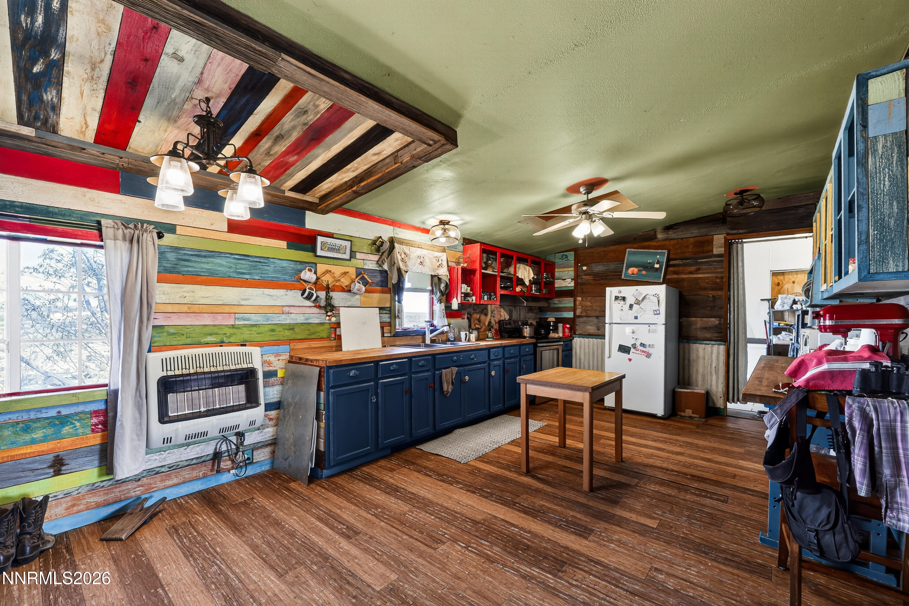 6877 Victor Drive Fallon, NV 89406 - Photo 12 of 50 a view of a room with chairs and wooden floor