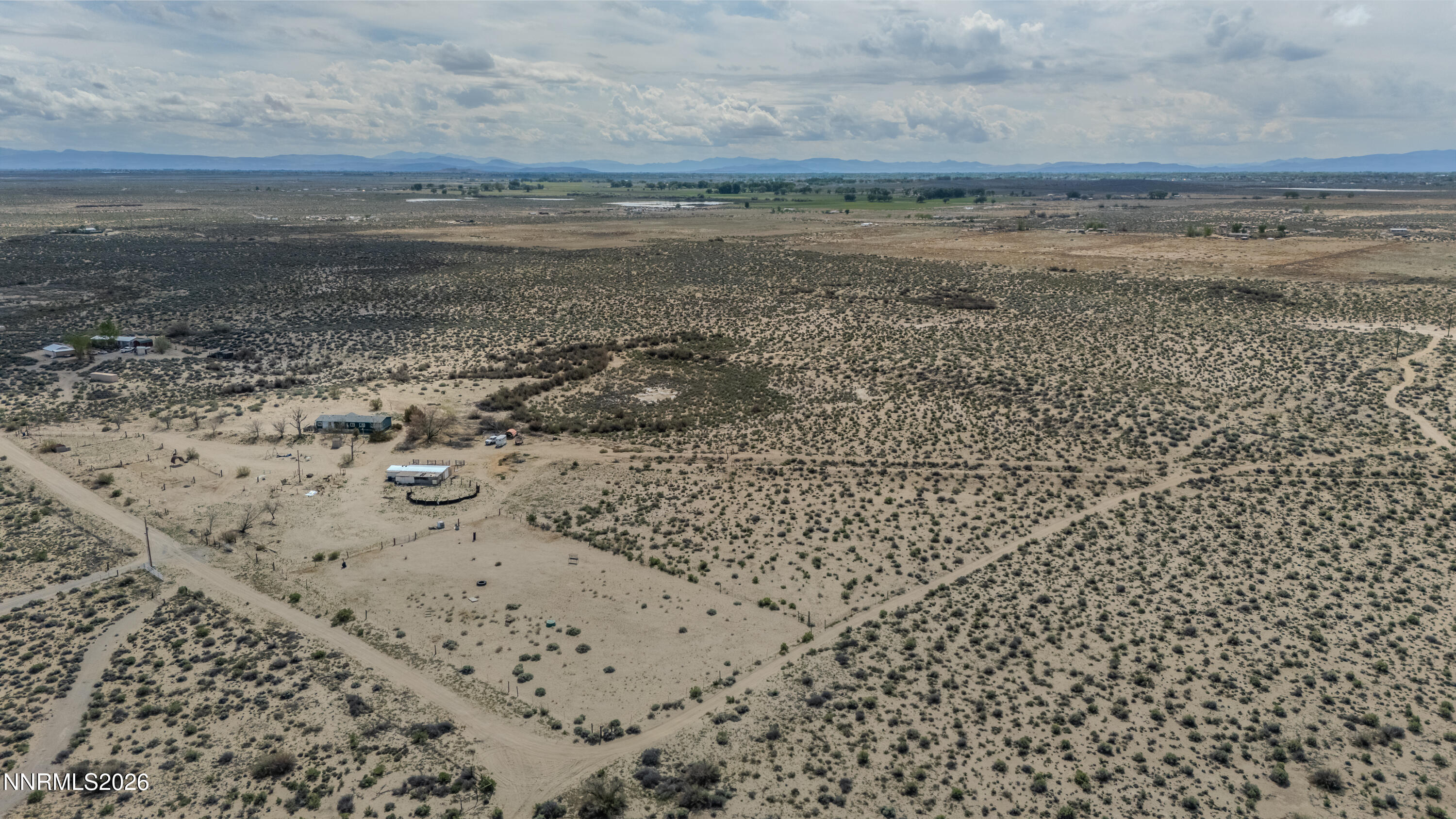 6877 Victor Drive Fallon, NV 89406 - Photo 37 of 50 a view of a dry yard with wooden floor