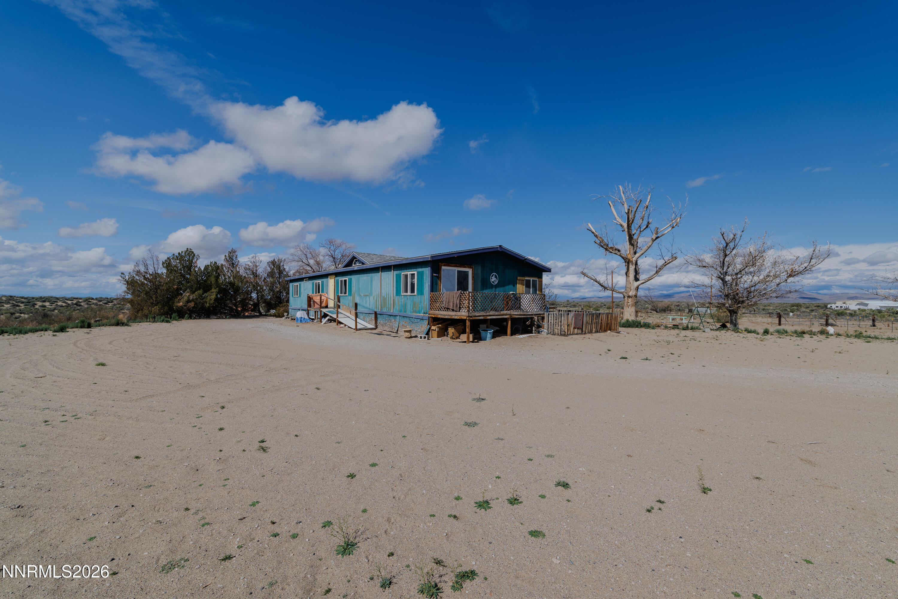 6877 Victor Drive Fallon, NV 89406 - Photo 4 of 50 a front view of a house with a yard