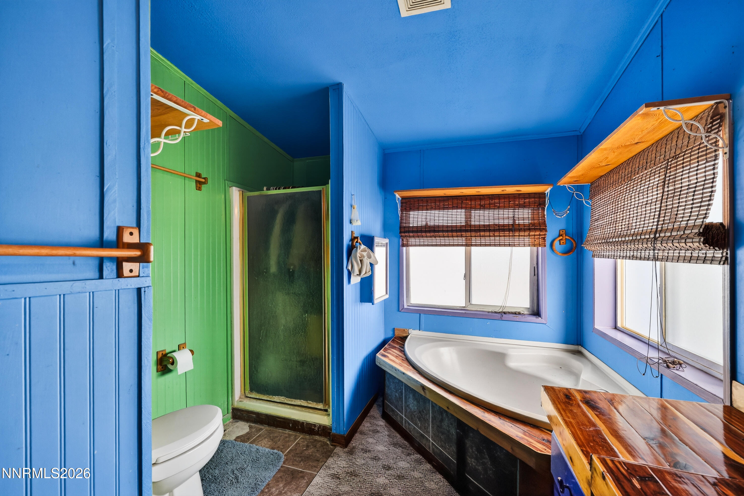 6877 Victor Drive Fallon, NV 89406 - Photo 9 of 50 a bathroom with a tub and a shower