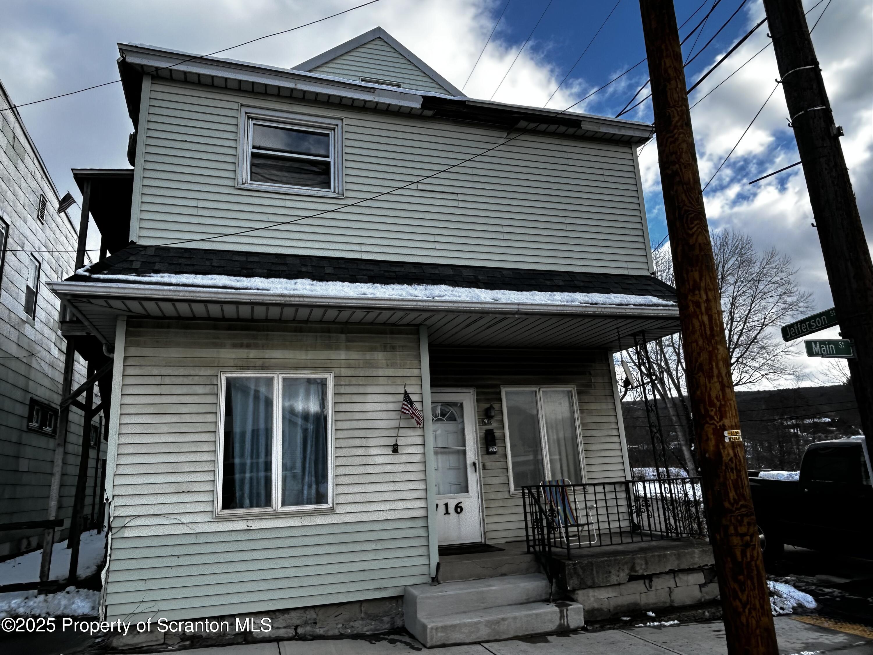 a view of a house with many windows