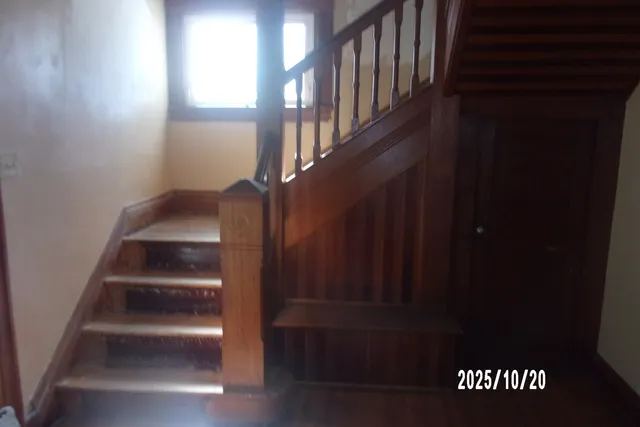 a view of a hallway with entryway