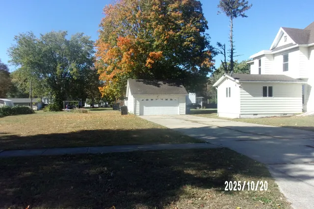 a kitchen with a refrigerator and window