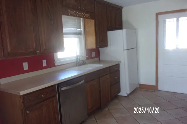 a kitchen with a sink and a cabinets