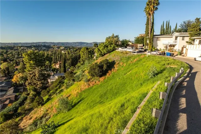 a view of a yard with an outdoor space
