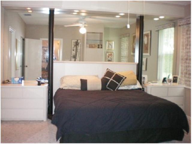 9998 Seacrest Circle, Unit B Boynton Beach, FL 33437 - Photo 14 of 23 a large bathroom with a tub and shower