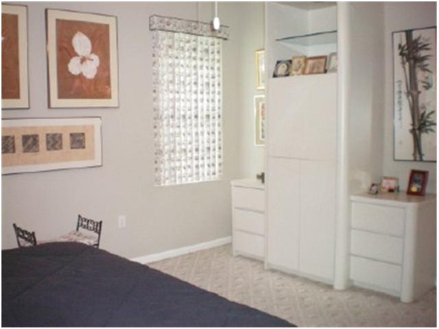 9998 Seacrest Circle, Unit B Boynton Beach, FL 33437 - Photo 16 of 23 a view of a bedroom with closet