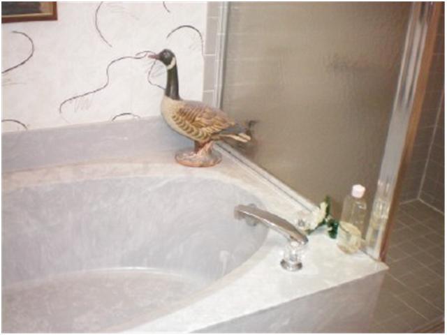 9998 Seacrest Circle, Unit B Boynton Beach, FL 33437 - Photo 18 of 23 a bathroom with a sink