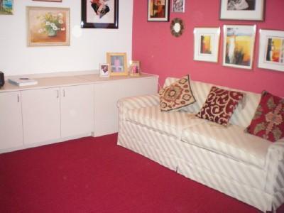 9998 Seacrest Circle, Unit B Boynton Beach, FL 33437 - Photo 19 of 23 a bedroom with a bed and a couch