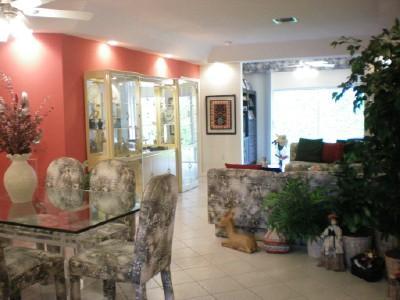 9998 Seacrest Circle, Unit B Boynton Beach, FL 33437 - Photo 2 of 23 a lobby with furniture and potted plants