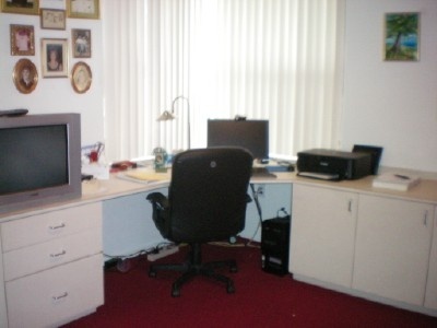 9998 Seacrest Circle, Unit B Boynton Beach, FL 33437 - Photo 21 of 23 a view of workspace with furniture and window