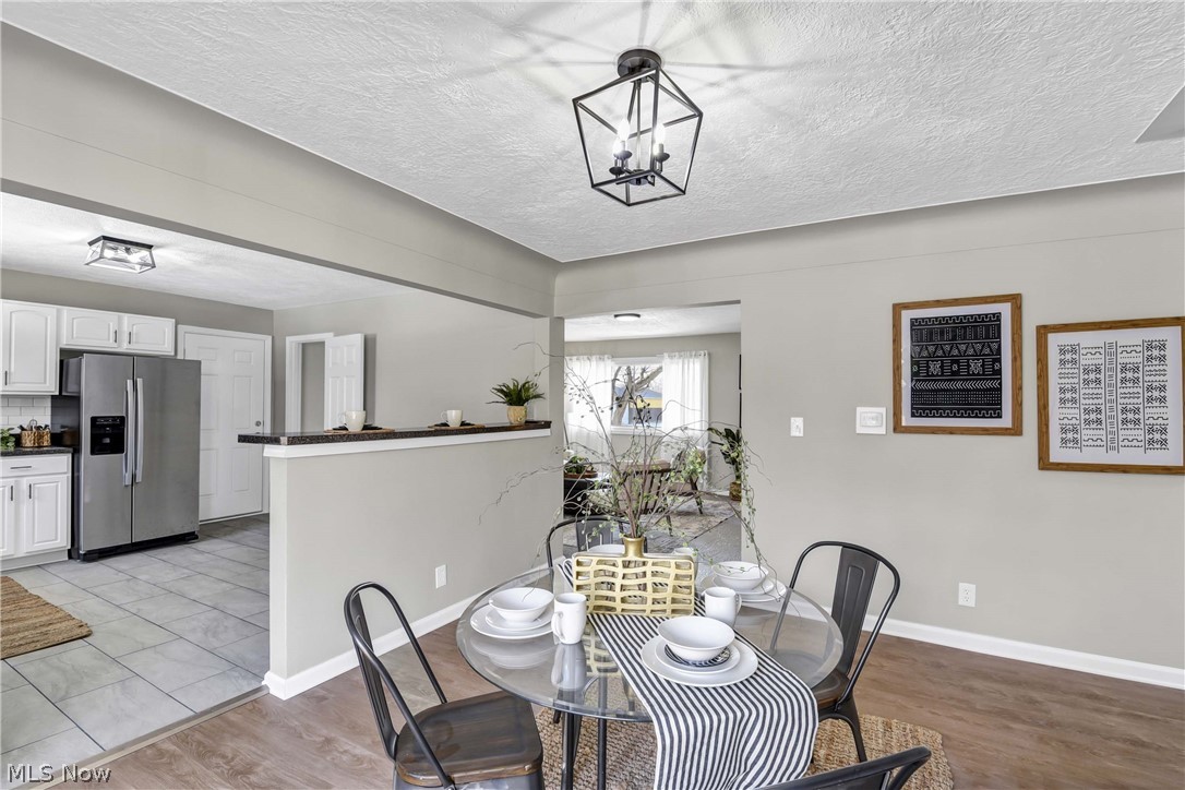 6672 Cleveland Road Ravenna, OH 44266 - Photo 34 of 34 Dining room and kitchen. Open floor plan