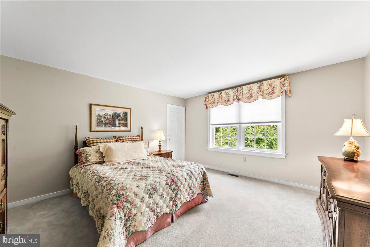 7 Bolingbroke Road West Chester, PA 19382 - Photo 37 of 86 Serene bedroom with natural light.